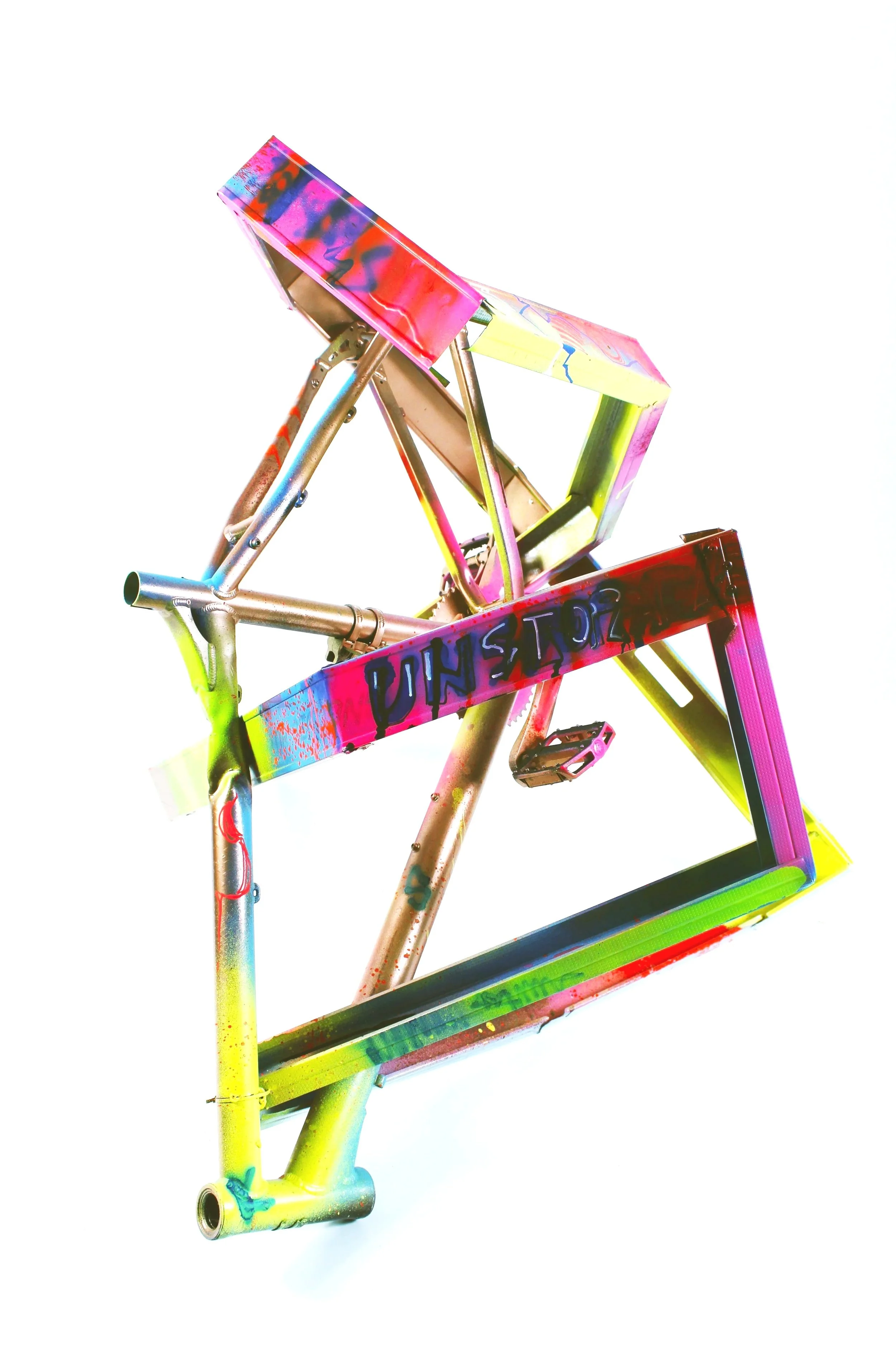 Colorfully painted bicycle frame with graffiti-style text and abstract patterns.