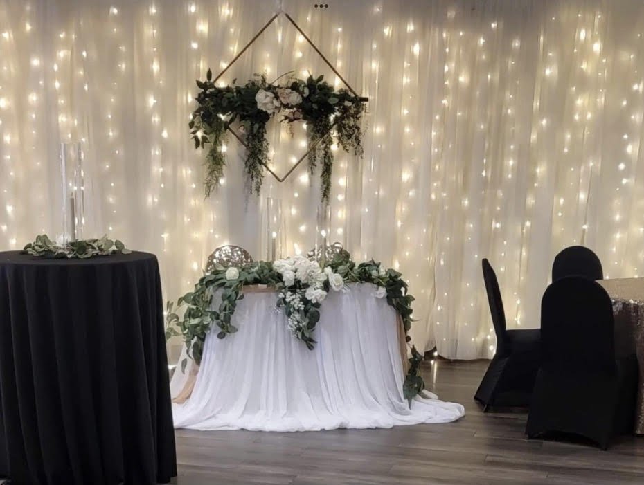 Laurie’s customers, Evan and Kade, running down a mountain after getting married. 