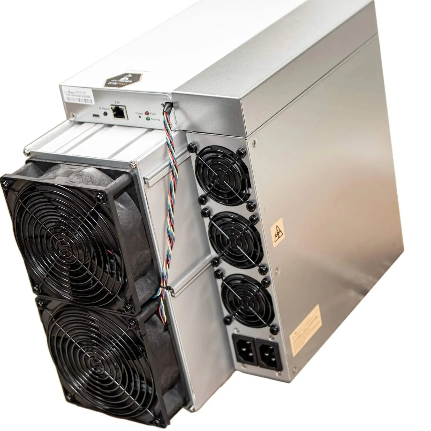 A silver cryptocurrency mining rig with multiple cooling fans, power supplies, and a circuit board.