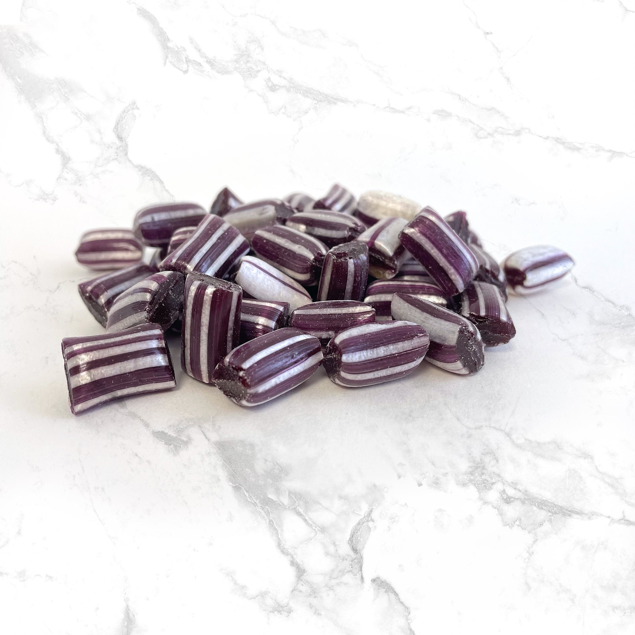 Grape Candy Puff on Marble Table