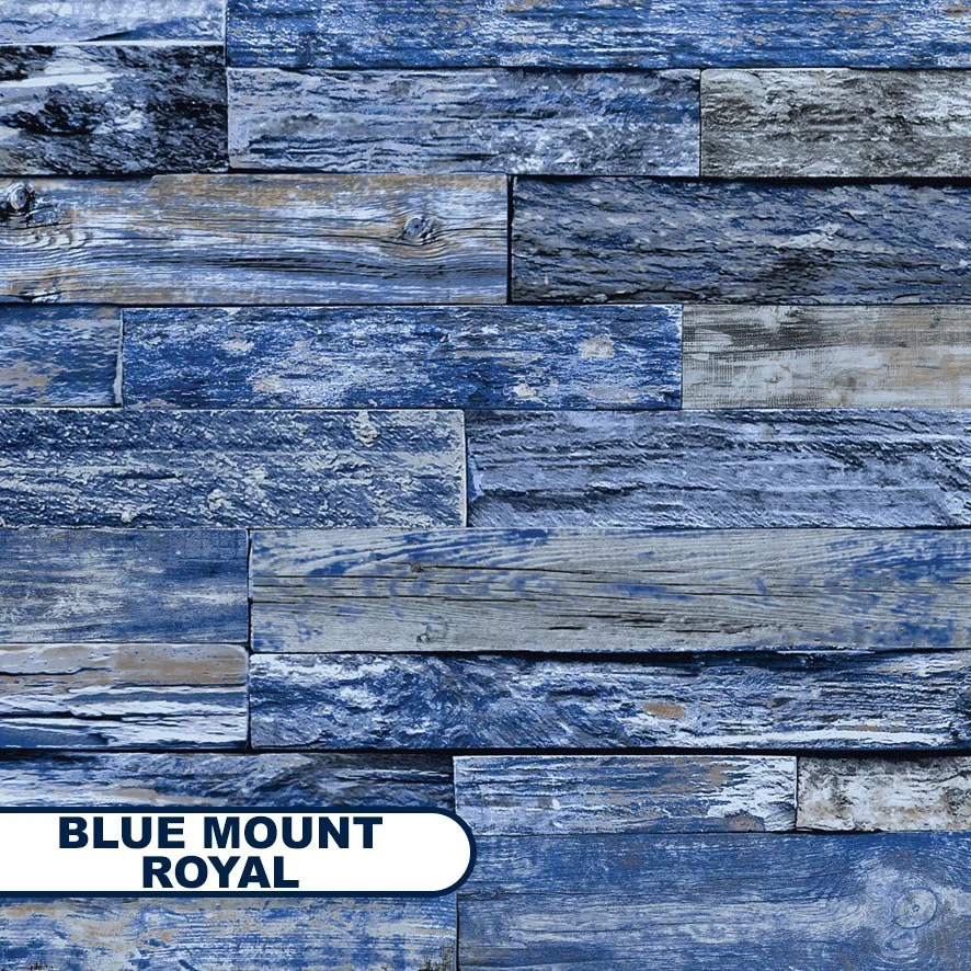 Close-up of a wall made of weathered wooden planks painted in blue, with the name 'Blue Mount Royal' in bold text at the bottom left corner.