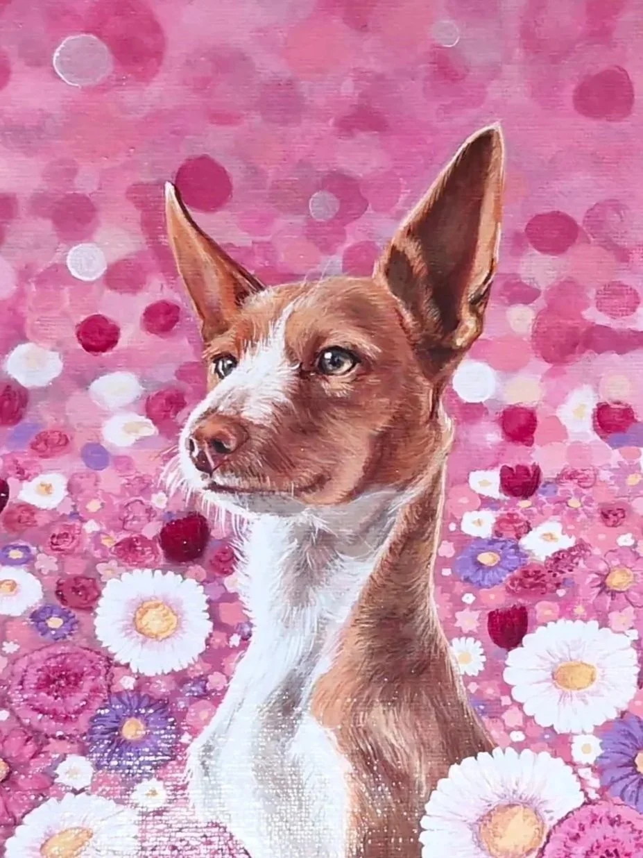 Painting of a brown and white hound type dog with large ears in front of a pink, purple, and white floral background.