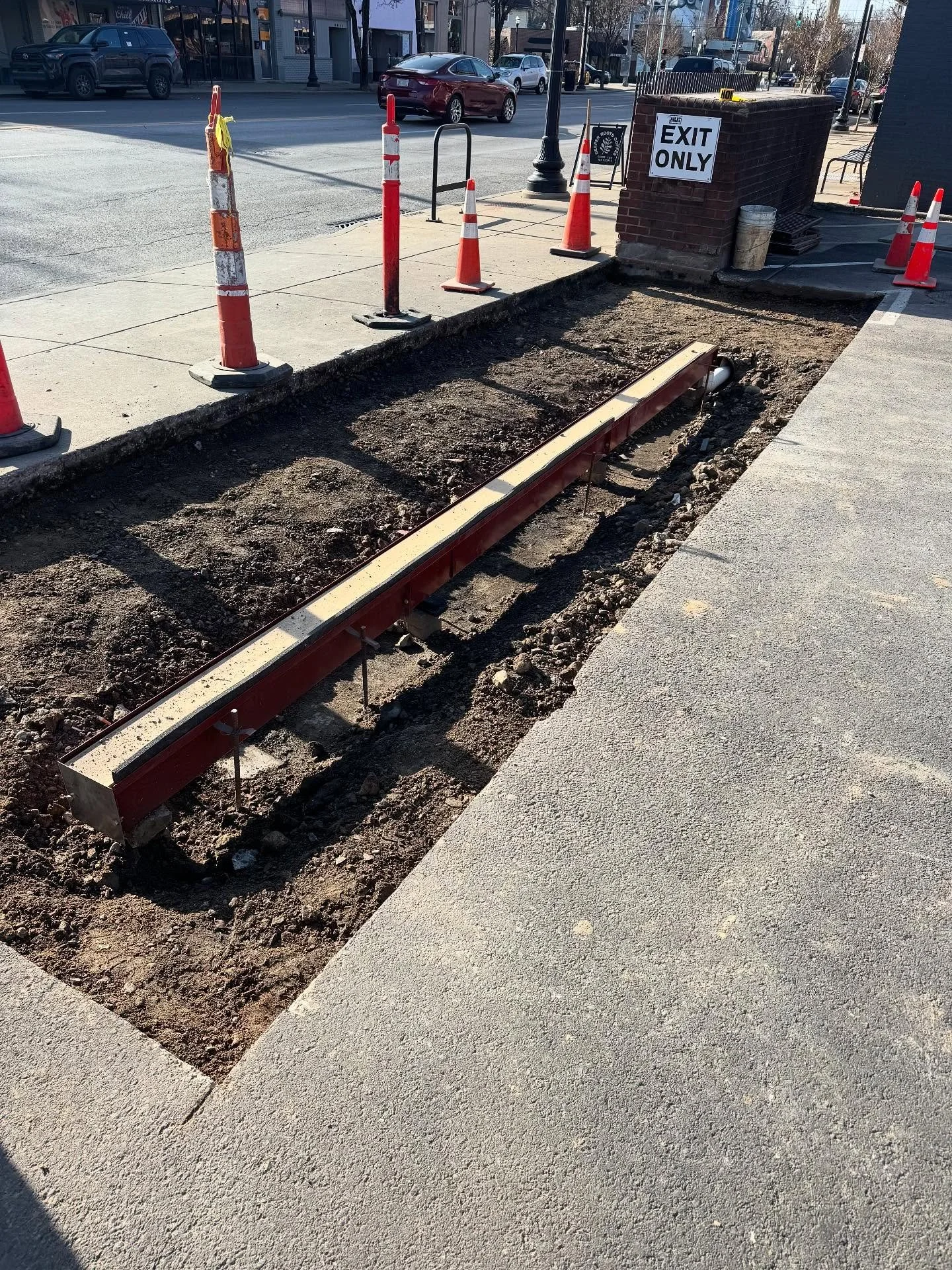 Getting the details right is crucial for a successful project - in this case, confirming the proper slope to a French drain before pouring concrete was a must do. Check out this one we did in Oakley👀