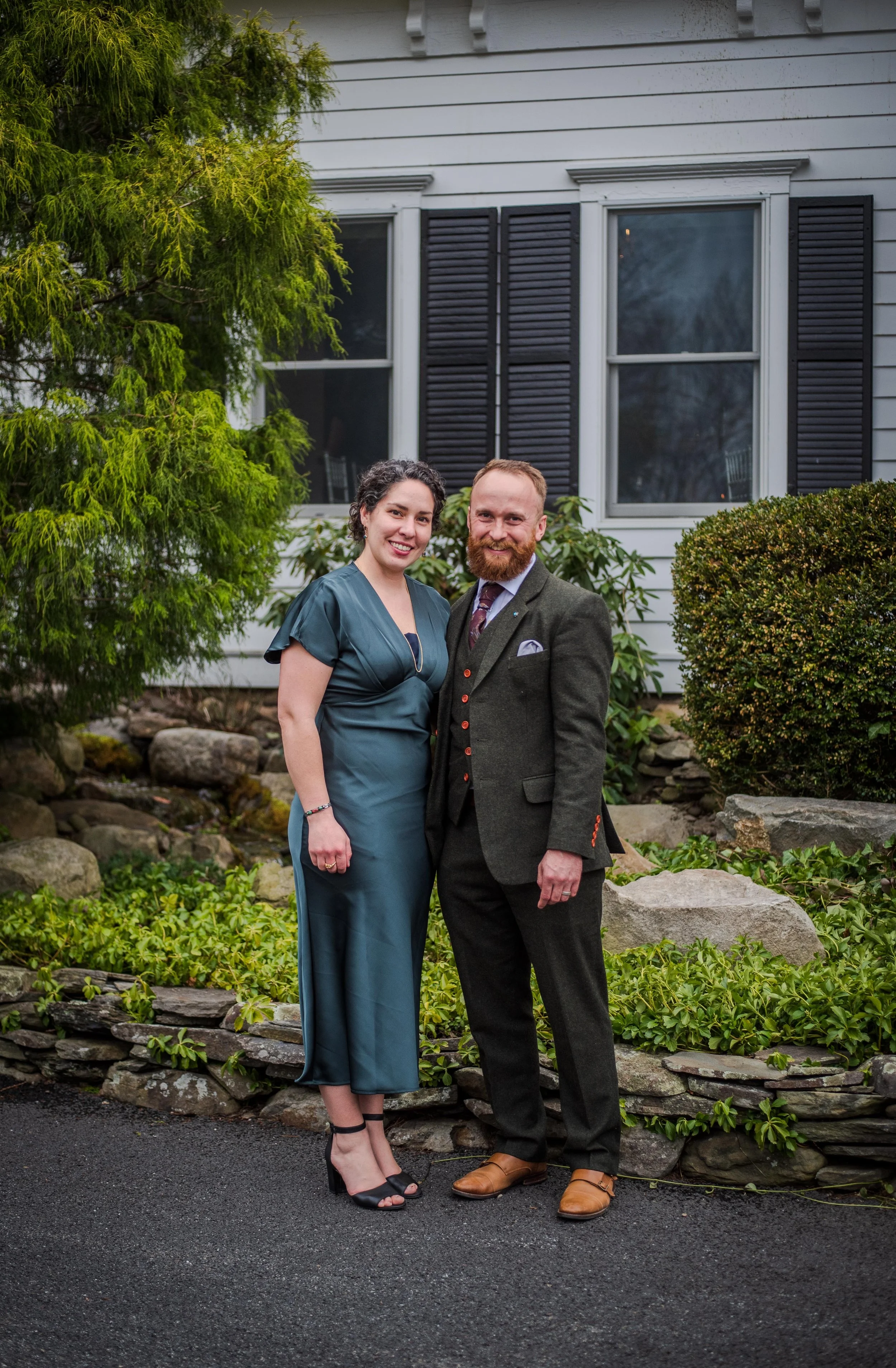 Benjamin and his wife, owners of Pro Clean Services, standing in front of a home in Hawley PA, your local window cleaning and power washing experts.