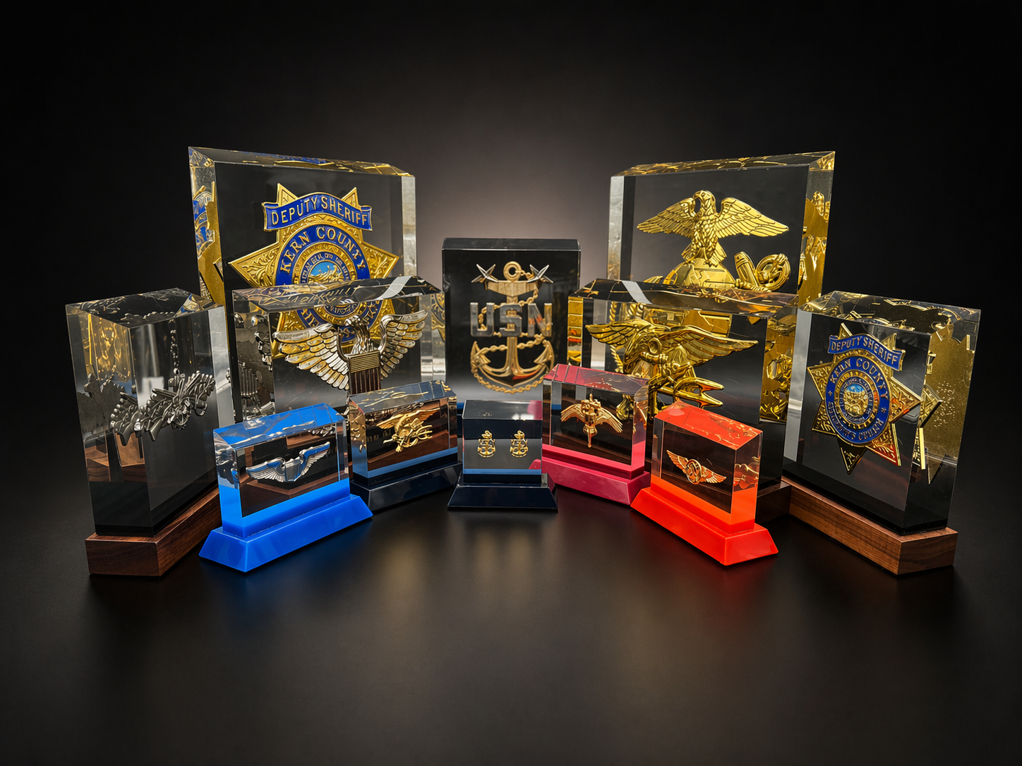 PromilleoGlass heirloom-grade glass monuments featuring BallistiGlass, GhostGlass, HaloGlass, and ExhibiGlass display pieces for military, law enforcement, and first responder recognition and legacy preservation.