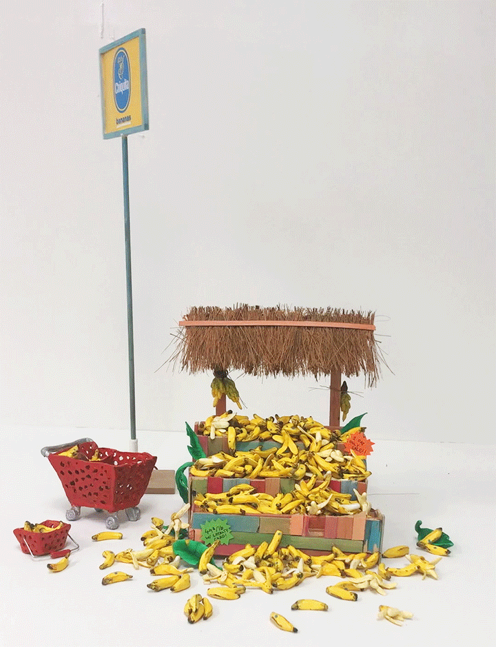 Bananas on sale! (Banana Massacre), 2018

mixed media

17 x 16 x 14 inches (43 x 40.5 x 35.5 cm)



This miniature piece alludes to both a charming banana stand found on the side of the road as well as a
grocery store display that could be found in T