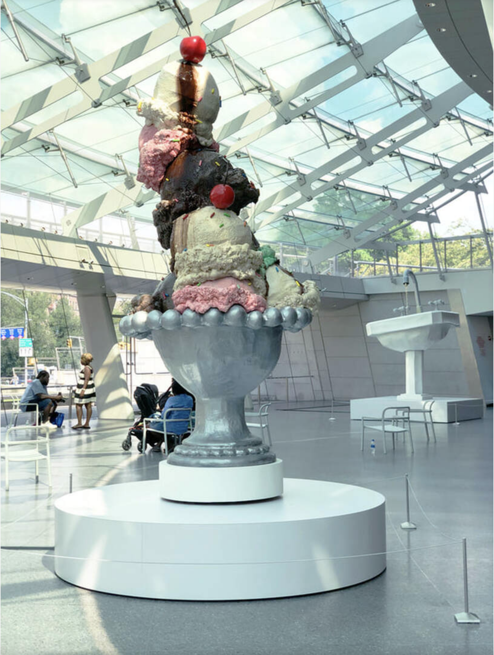 B.S.O. (Bright Shiny Object). 2020 Foam, plastic, electric pump, chocolate, oil. 12' x 5' x 5'. Brooklyn Museum.