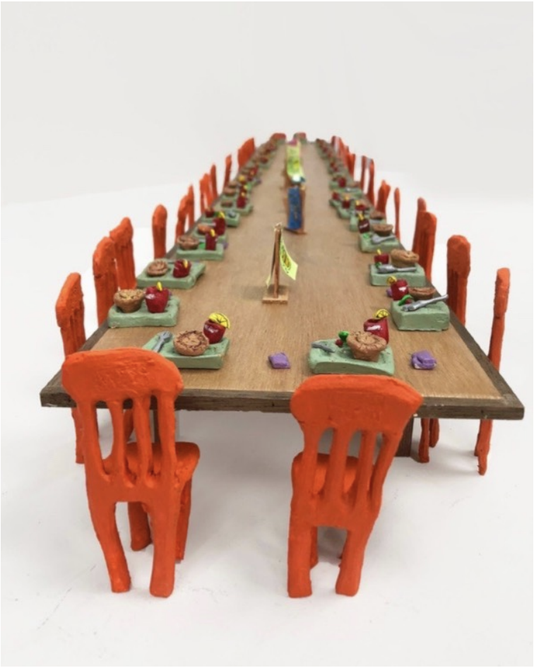 Turkey Pot Pie Special Only at Marie Callender’s (The

Last Supper), 2018
ceramics and mixed media
3.5 x 51.5 x 6.5 inches (9 x 131 x 16.5 cm)



This piece re-imagines the real-life last meal of the cult Heaven’s Gate, of whose 39 members ordered th