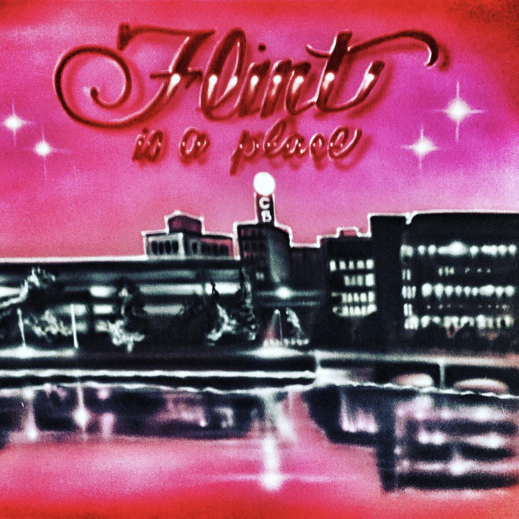Pink neon sign with the words 'Flint is a place' above a city skyline, with reflections on a shiny surface below.