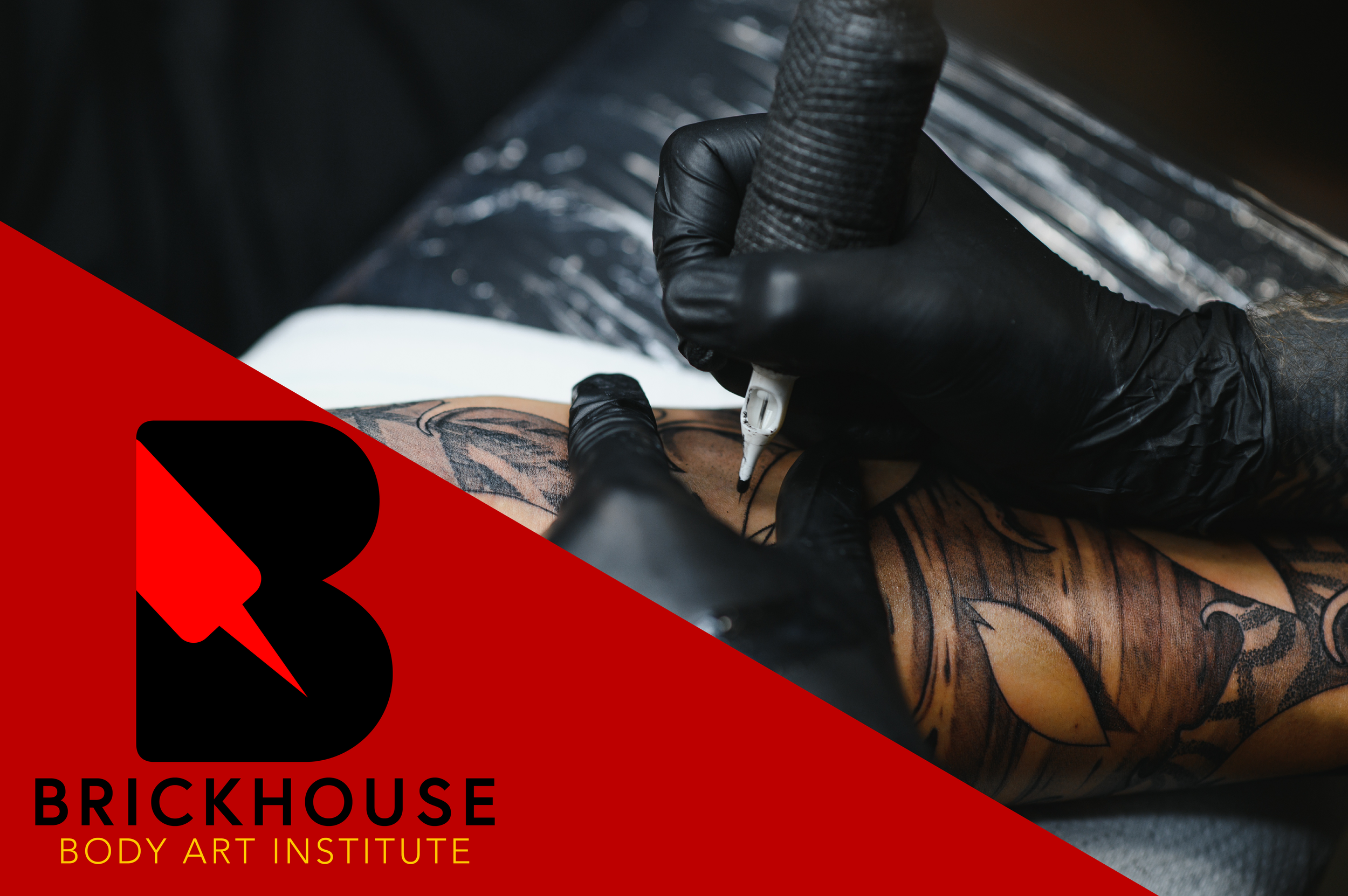 tattoo machine applying ink to a forearm.