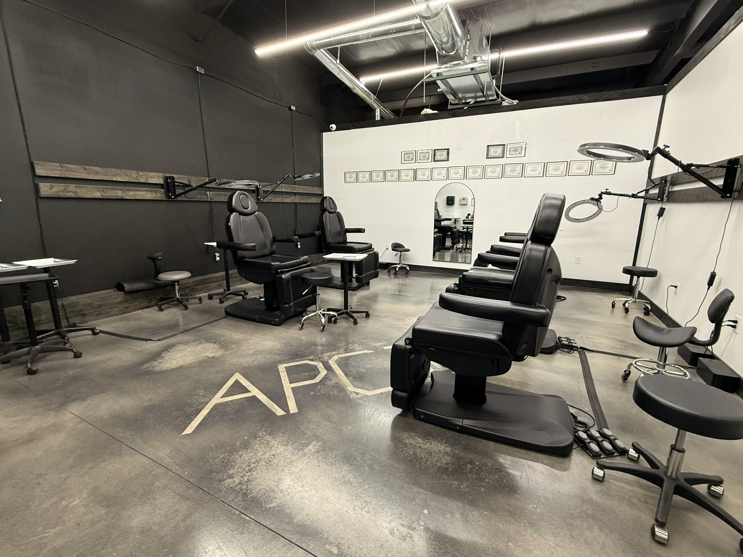 Clean permanent makeup studio with treatment chairs prepared for PMU services