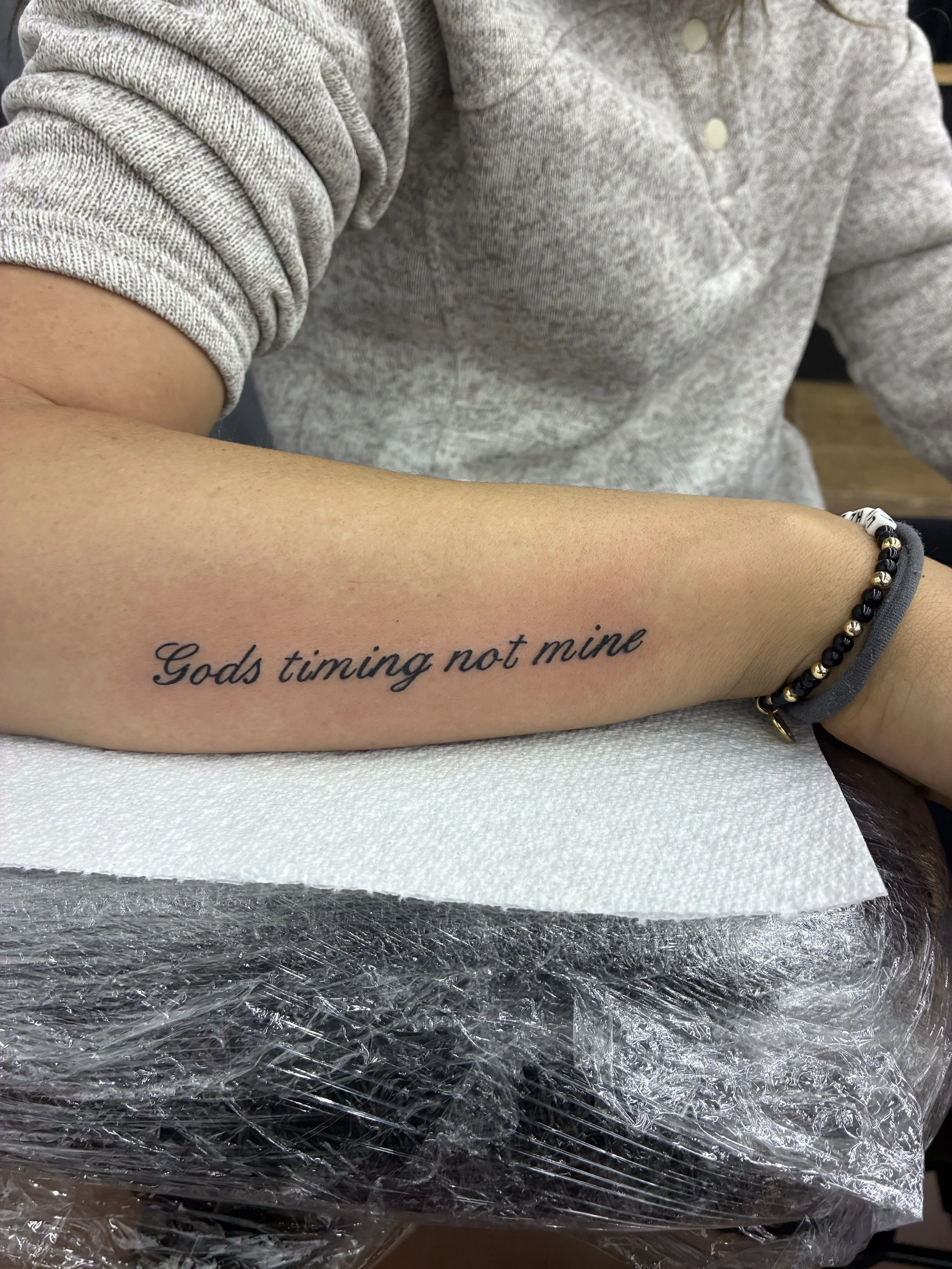 Black font tattoo 
