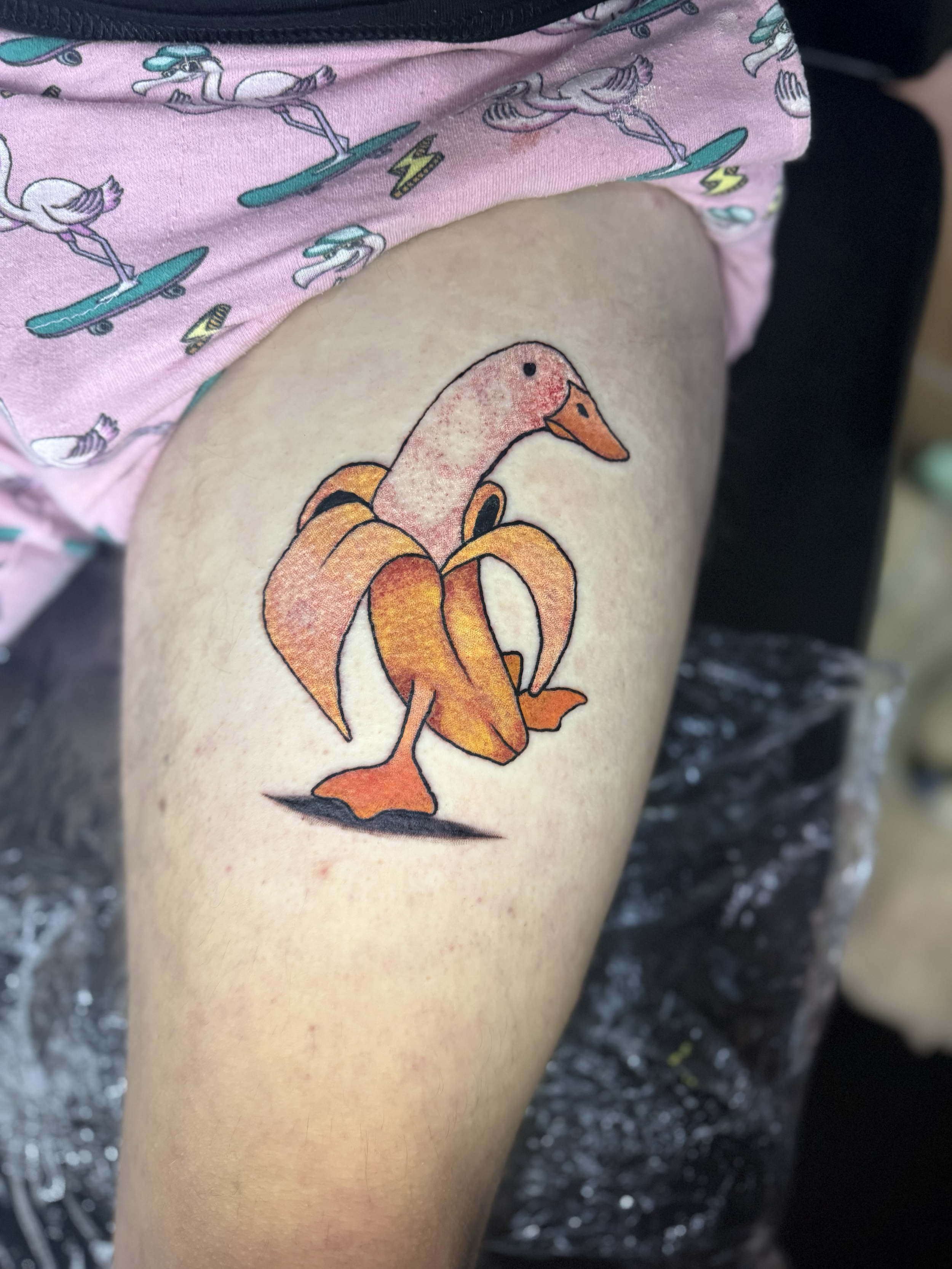 Illustrative color duck banana tattoo