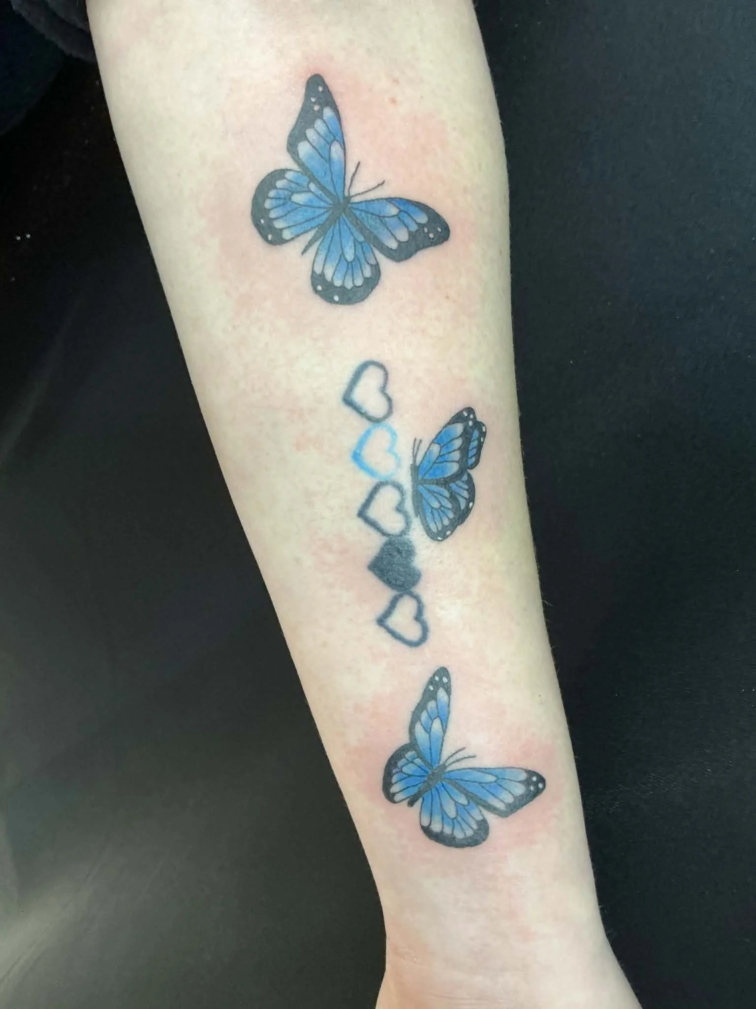 Butterflies and hearts color tattoo