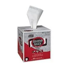 A box of Shop Max tissues with one tissue pulled out of the top.