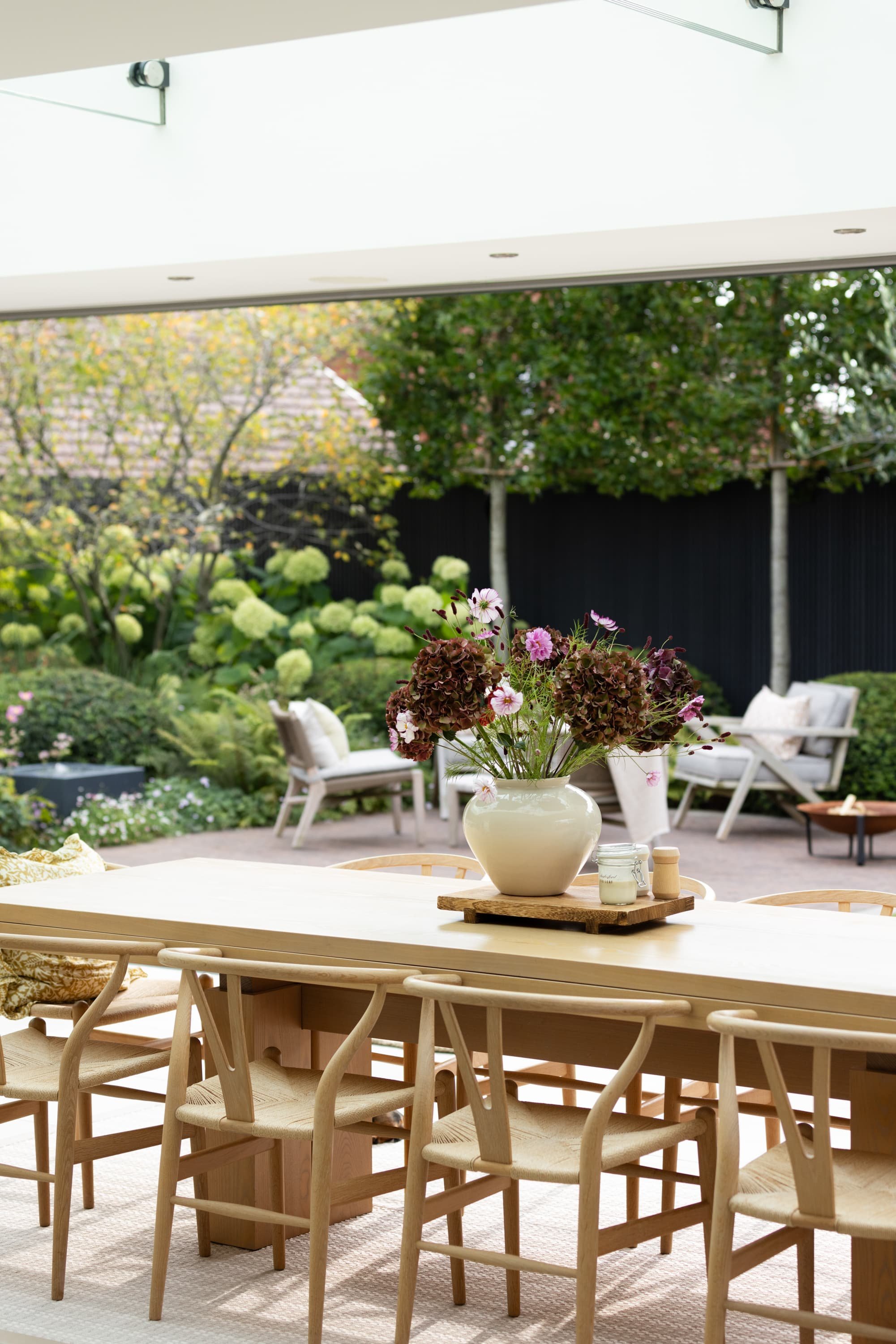 Hydrangeas and Mediterranean planting adding seasonal color, softness, and movement