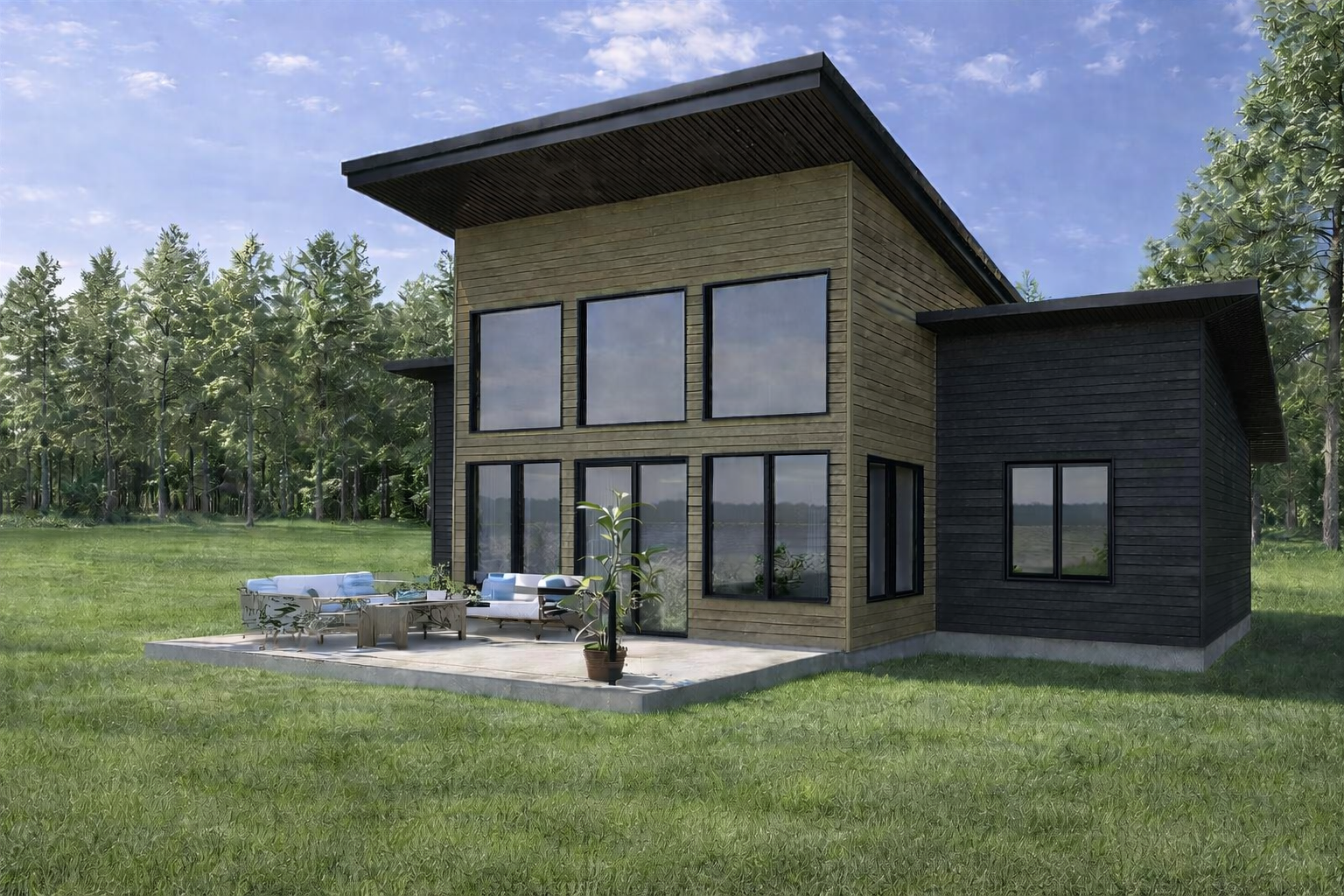 Maison moderne en bois avec de grandes fenêtres, terrasse avec mobilier et pot de plante, entourée d'un terrain vert avec des arbres au fond, sous un ciel nuageux.