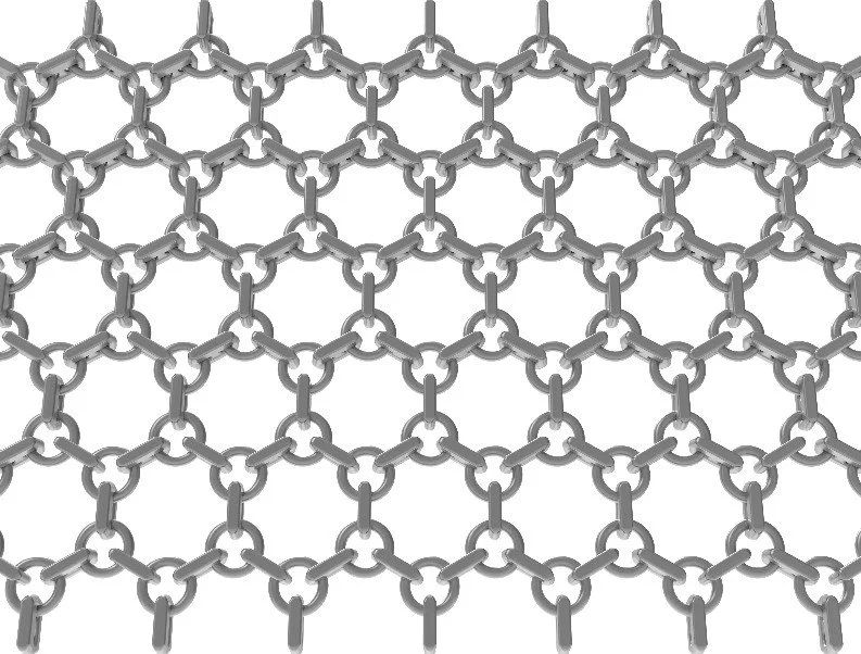 Close-up of a metallic chainmail fabric with interlinked rings arranged in a hexagonal pattern.
