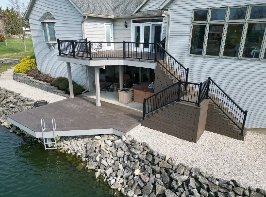 Two story PVC deck with staircase and aluminum handrail