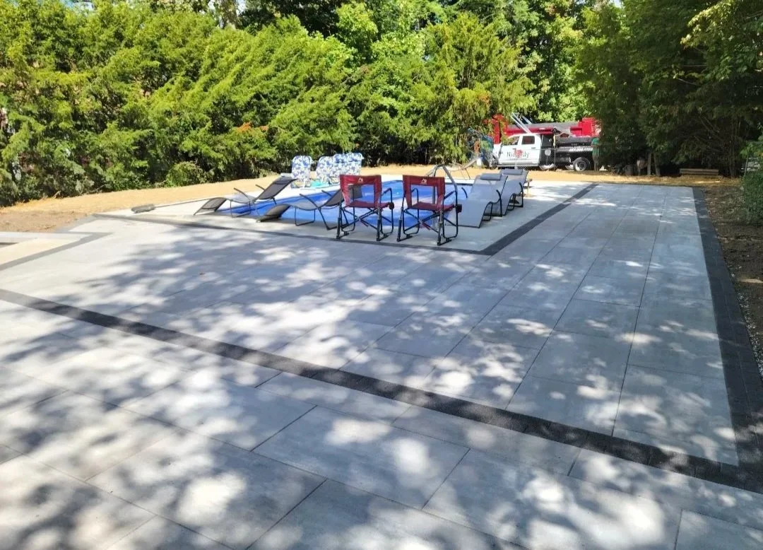 Paver patio near a pool