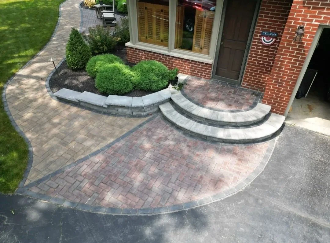 Paver walkway and entrance to a home