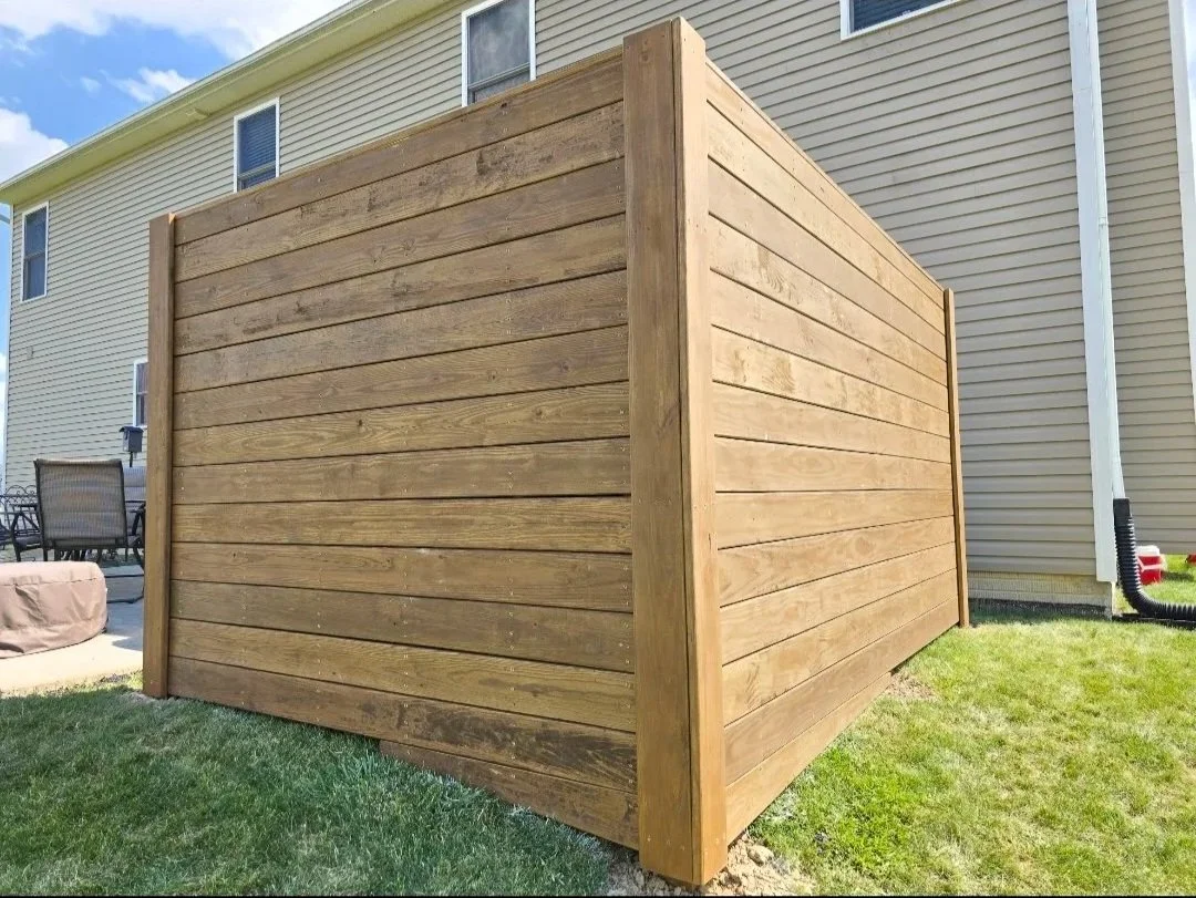 Handcrafted wood and stained privacy fence