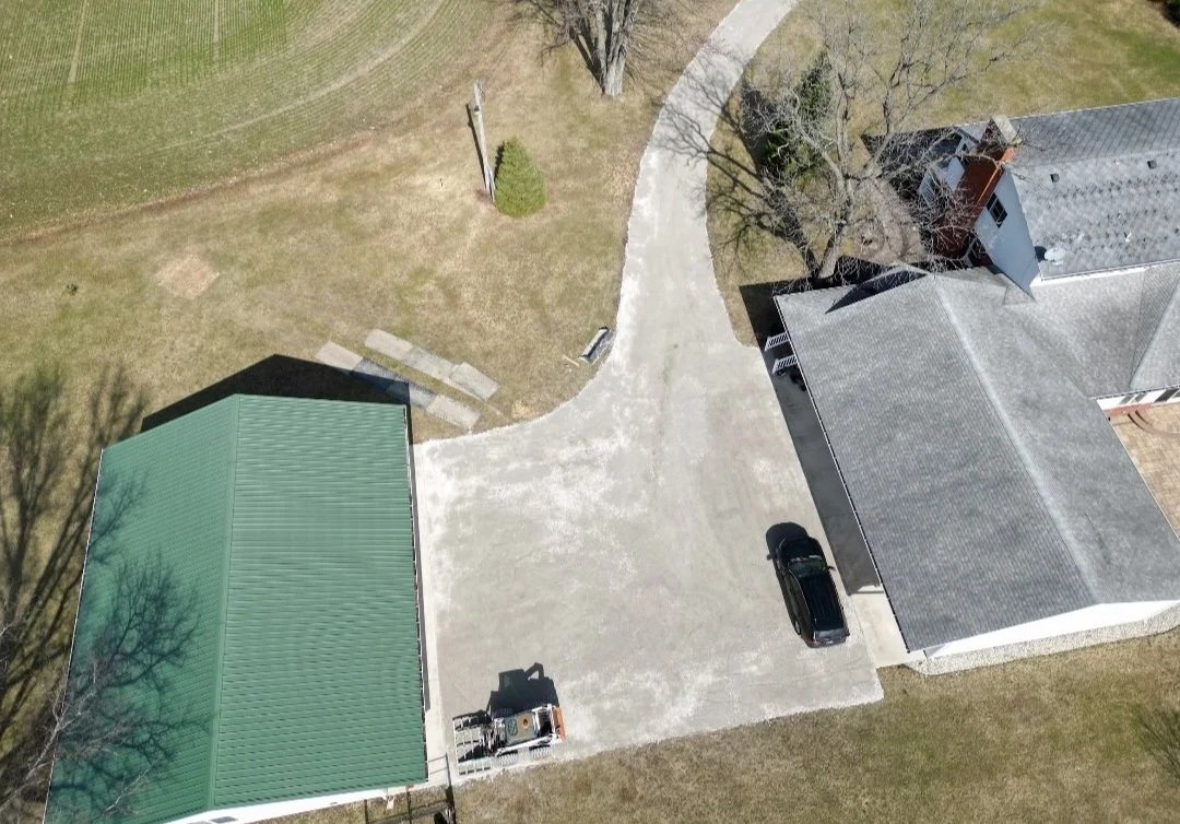 releveling and top dressing of a stone driveway