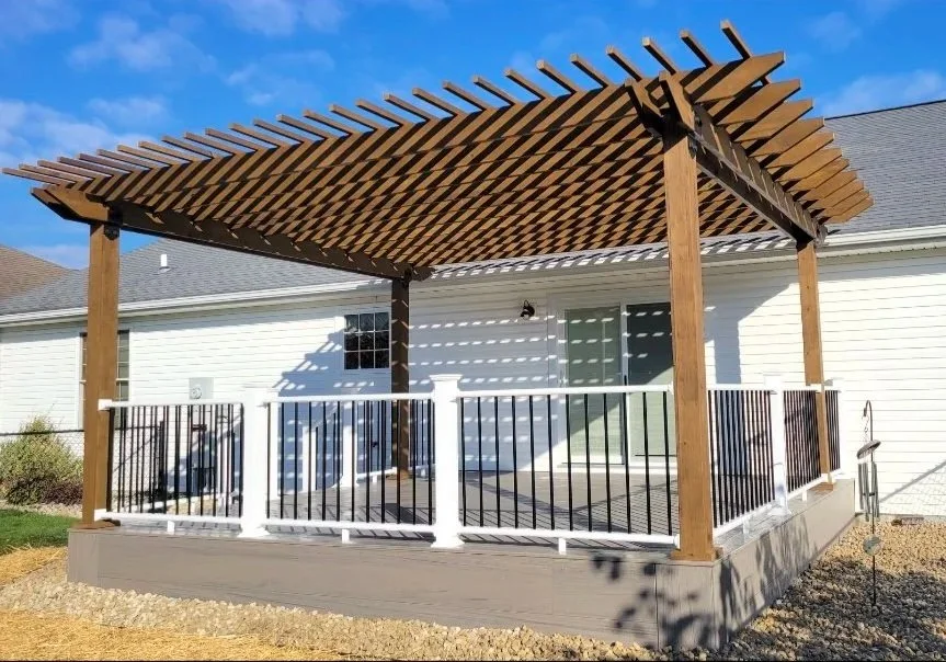 deck with handcrafted and stained pergola