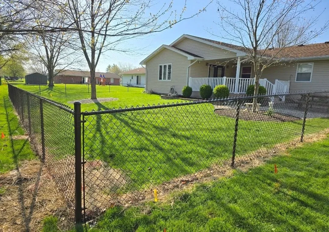 brown painted chain link fence