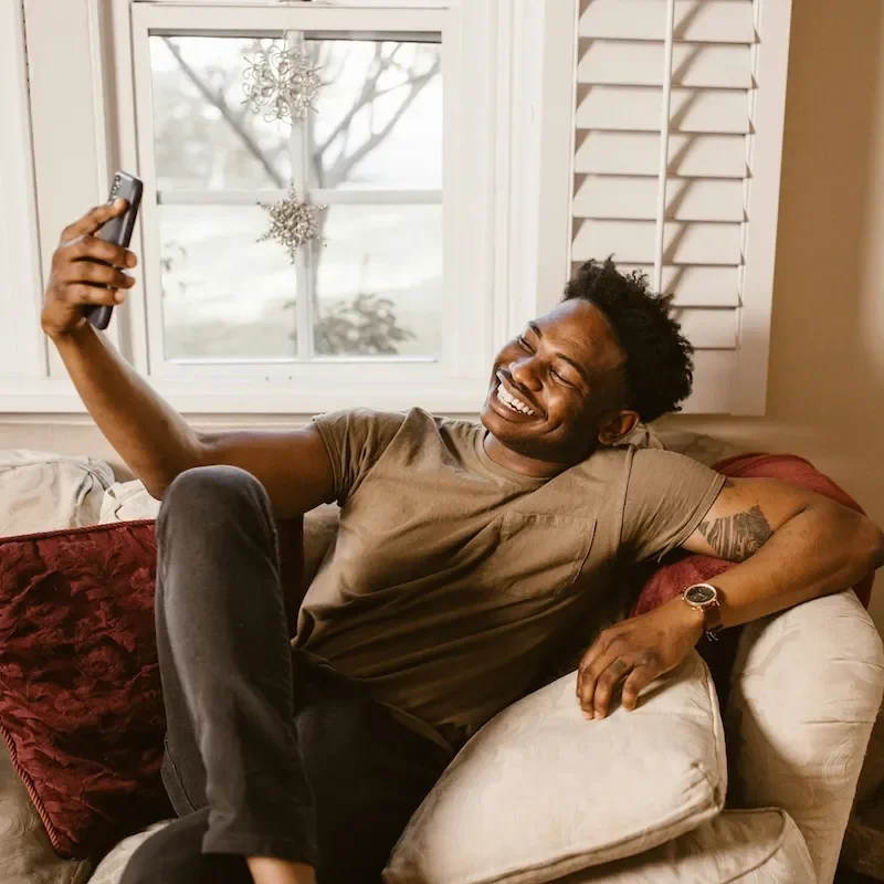 man smiling on video call