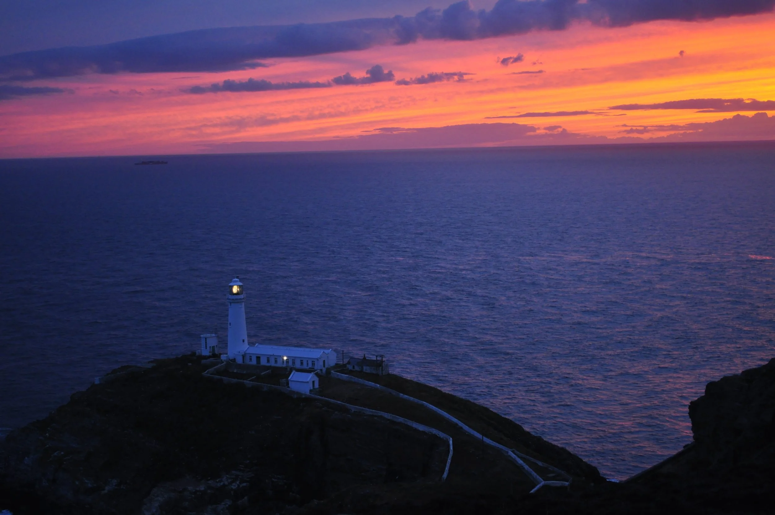 Sunset by South Stack lighthouse on the Anglesey coast