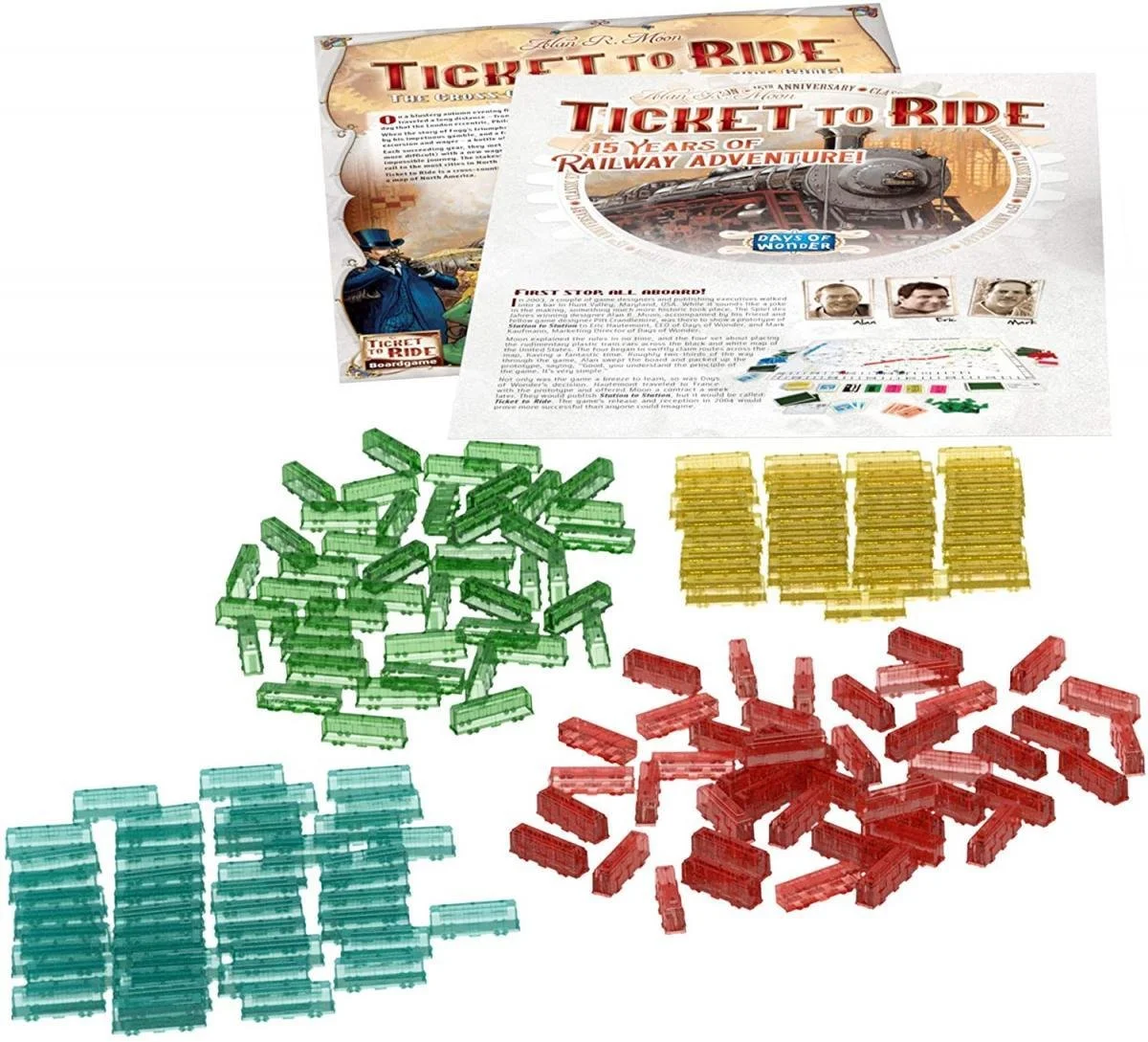 Board game components for Ticket to Ride, including colorful plastic train pieces in green, yellow, blue, and red, along with game cards and game sheets.