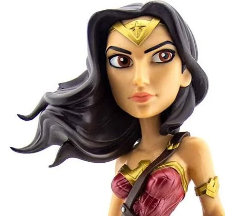 A stylized action figure of Wonder Woman with long black hair, a gold tiara, and a red and gold costume.