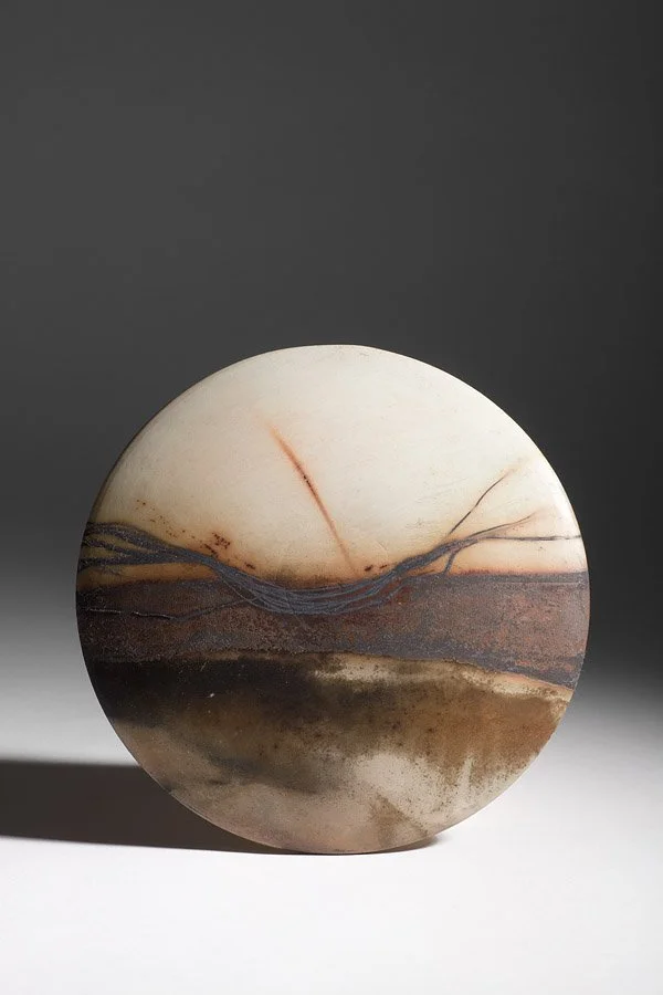 ´Lough Ihne Sunset´ 2012 Midi Wall Disc
White Stoneware Clay, Thrown & Saggar Fired with West Cork sawdust, seaweeds, recycled wires & oxides 
(H) x (L) x (W)
19 cm x 19 cm x 2.5 cm