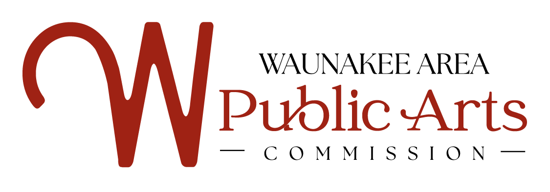 The image displays a logo with a large maroon letter 'W' followed by the words 'Public Arts' in maroon script font.
