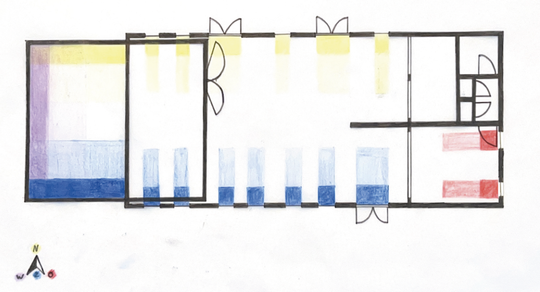 Color-coded floor plan of a building with various rooms and doors, including a main entrance, depicted with colored sections.