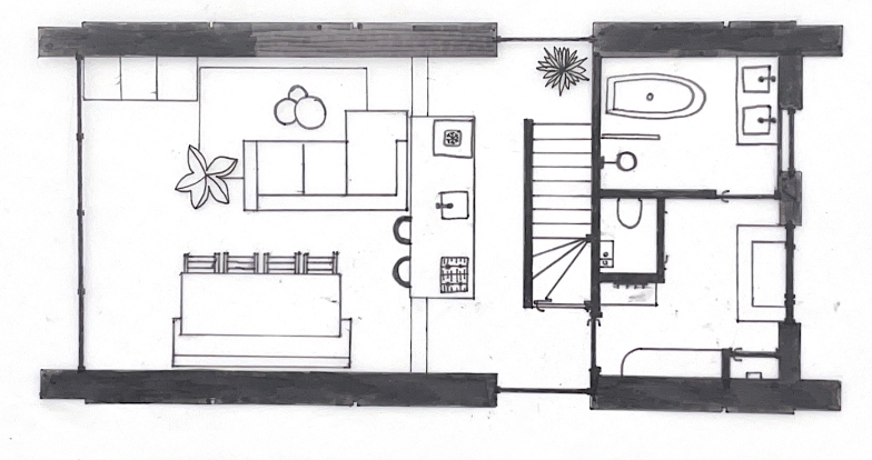 Floor plan of a small apartment with an open living room, kitchen, dining area, and separate bedroom and bathroom.