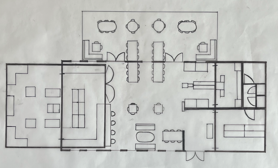Floor plan of a building with multiple rooms, including a lounge, dining area, and conference rooms.