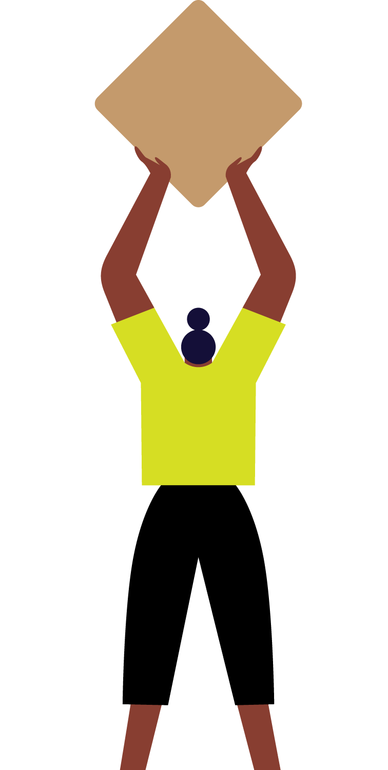 A person with dark skin and dark hair in a bun, wearing a yellow shirt, holds a large cardboard box above their head.