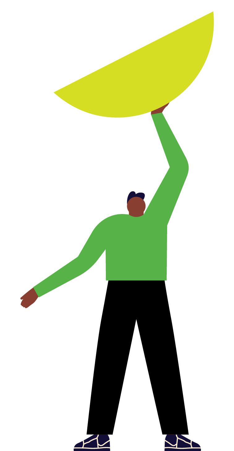 A person with dark skin and dark hair, wearing a green shirt and dark shoes, is holding a large yellow leaf above their head with one hand.