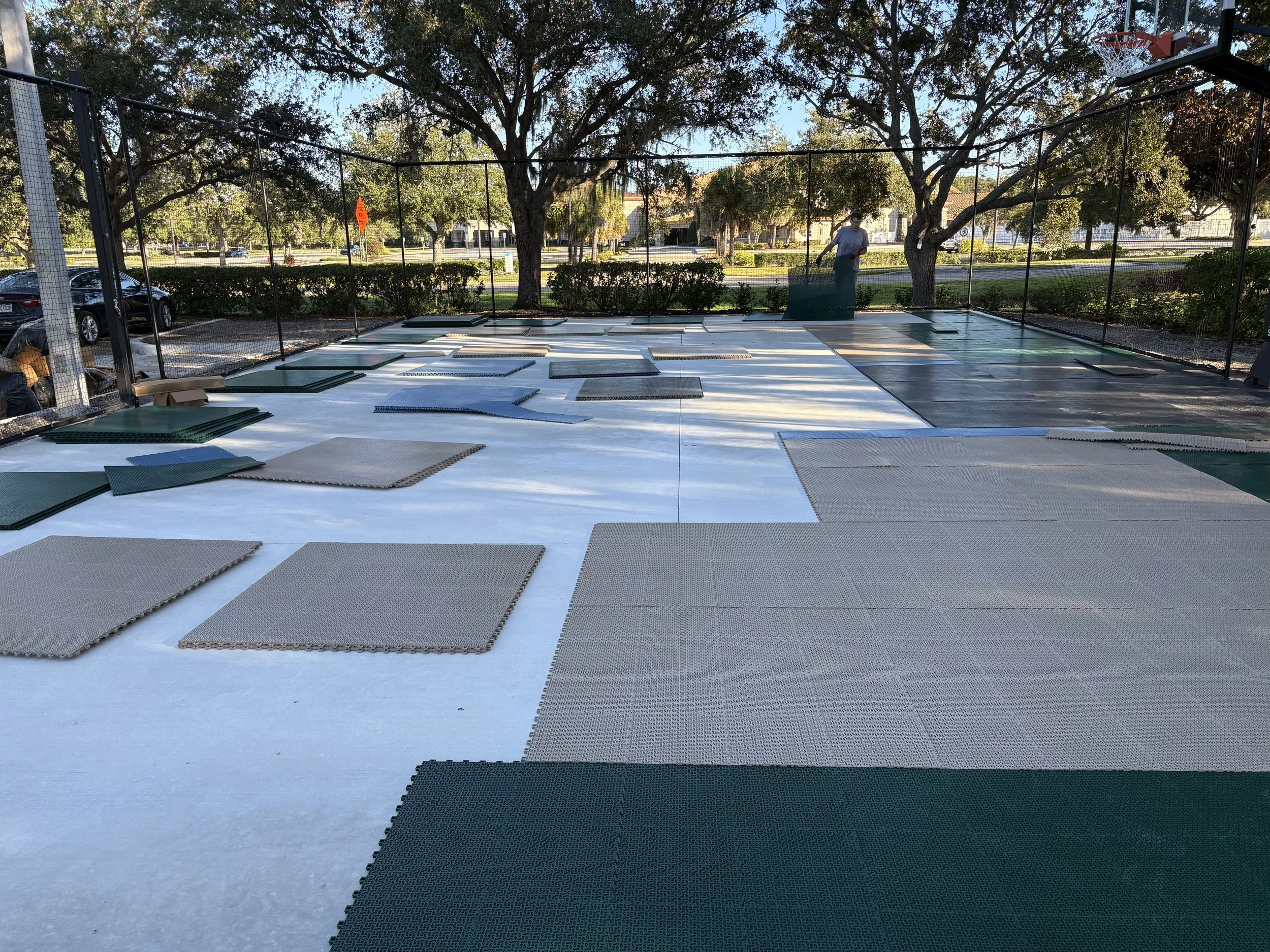 CC laying tiles.jpeg