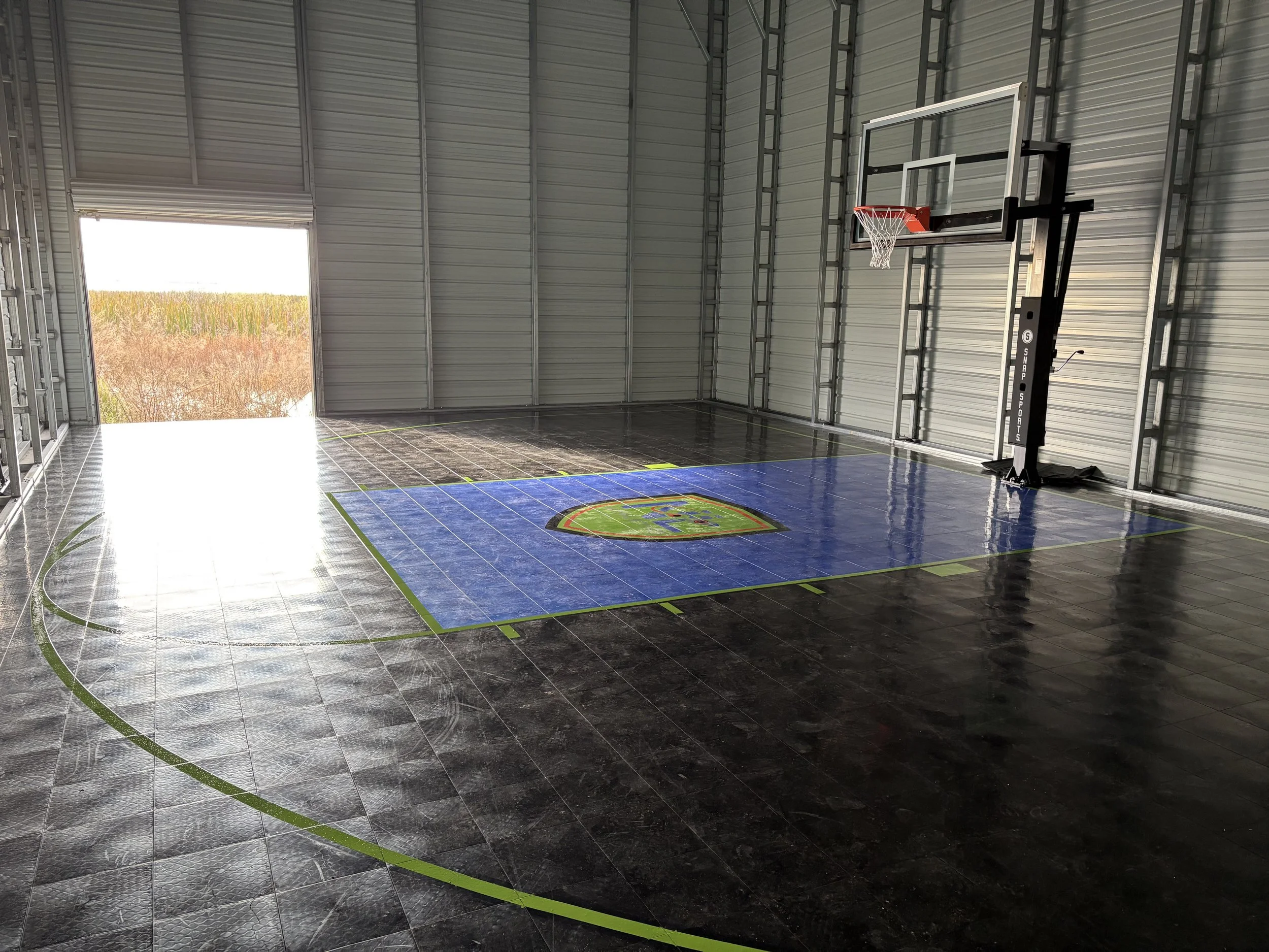 Detached home gym with marsh views.
