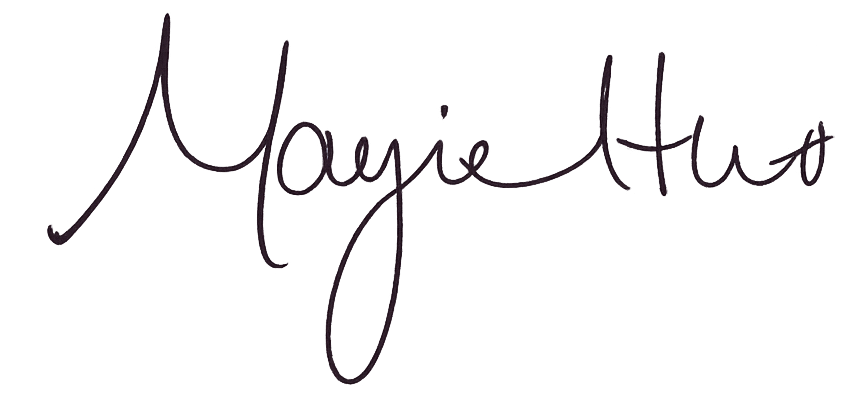 A signature that reads 'Moysie Atto' in cursive handwriting.