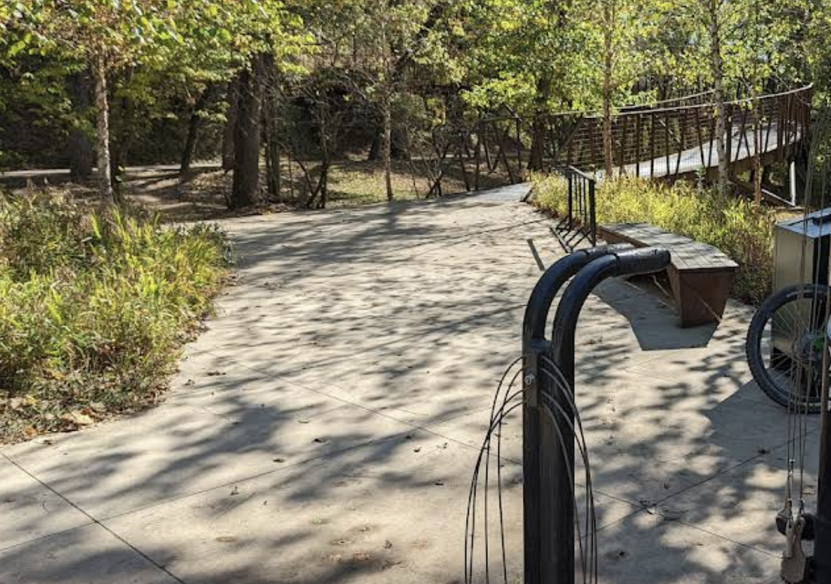 A view of the bridge to Oscar's Lower Trail from the North Gateway parking lot at Coler MTB Preserve.