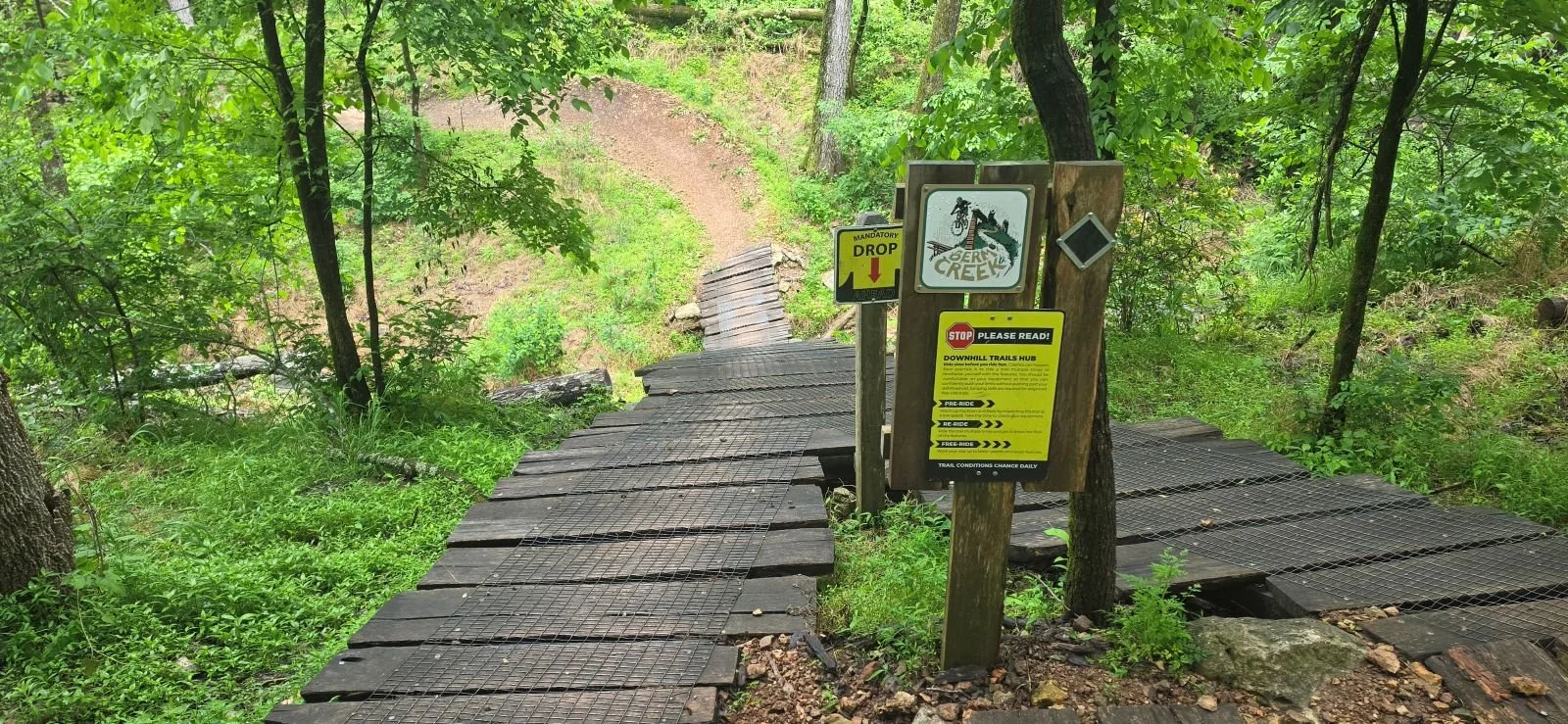 A view from the top of the Berm Creek ramp showing the drop into the ramp that crosses a creek in Slaughter pen