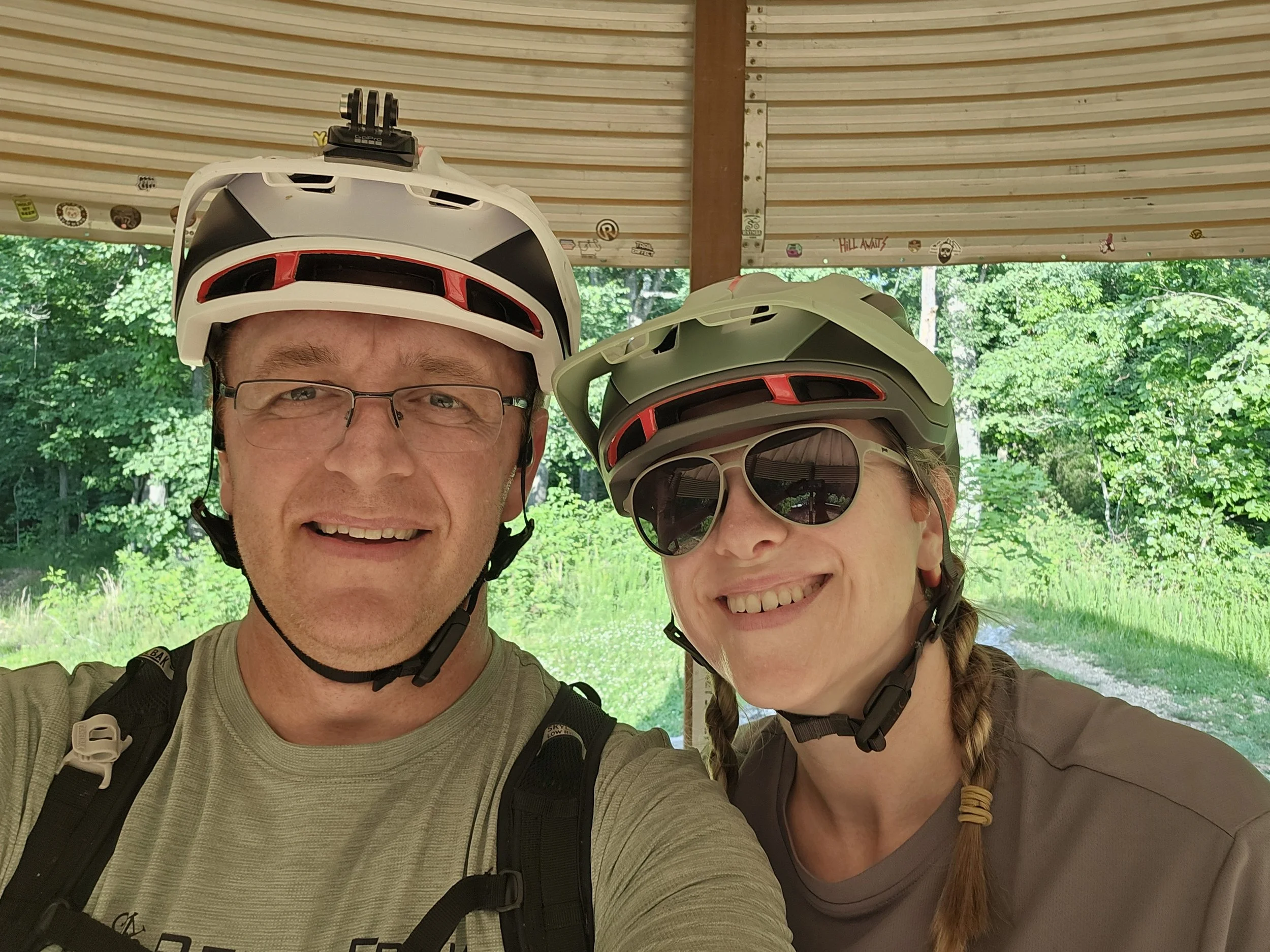 The owners of NWAtrails.com at the trailhead silo in Hand Cut Hollow.