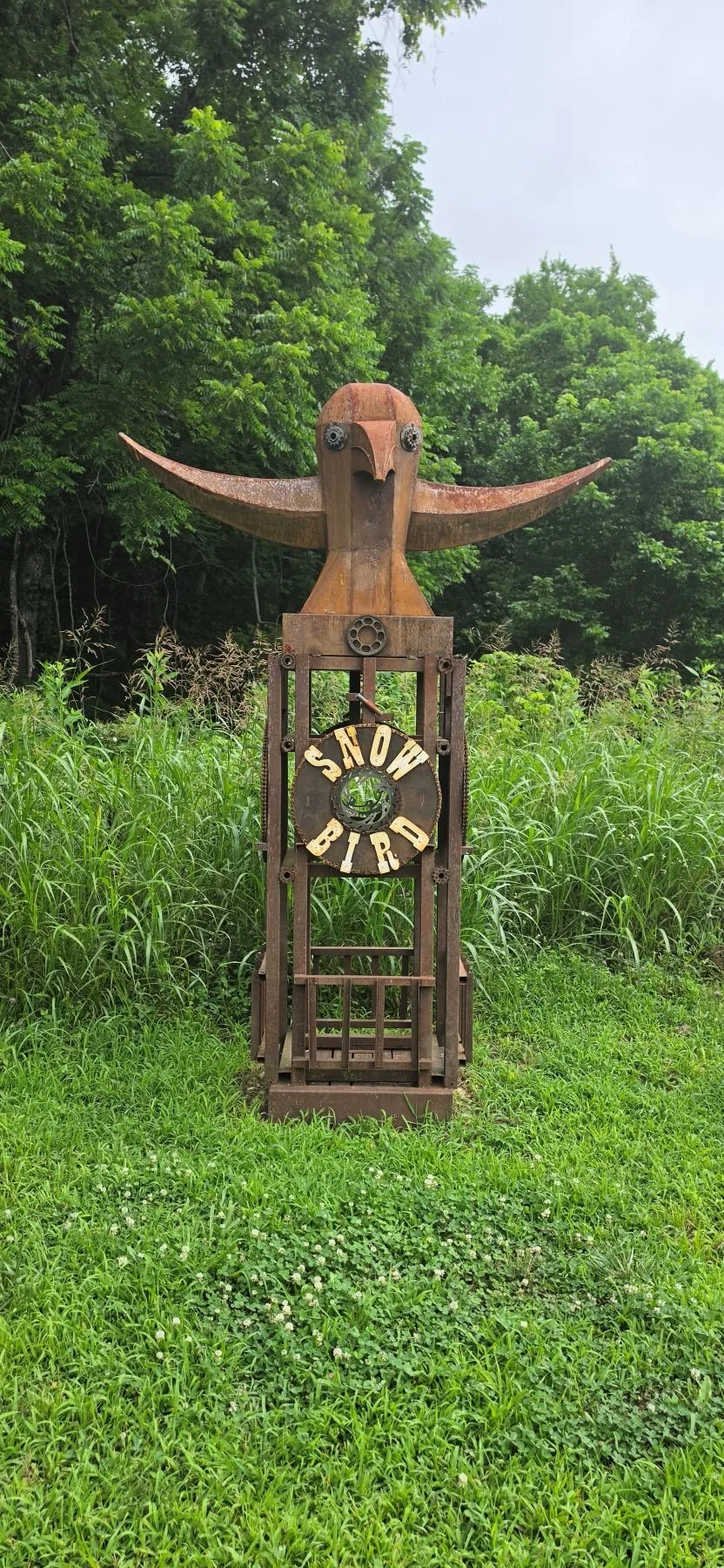 An image of the Snowbird Sculpture that is found at the trailhead parking lot depicting a metal bird