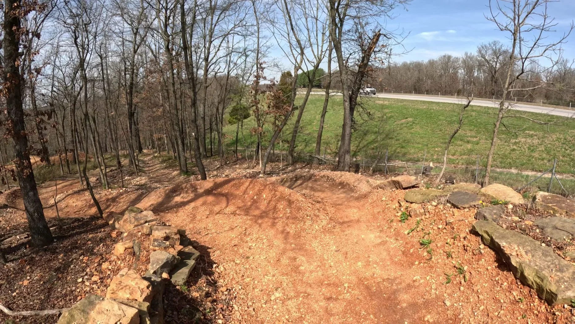 The fork in the trail for both Dragon Scales and Loam Wolf that occurs right after the initial ramp off the Castle.