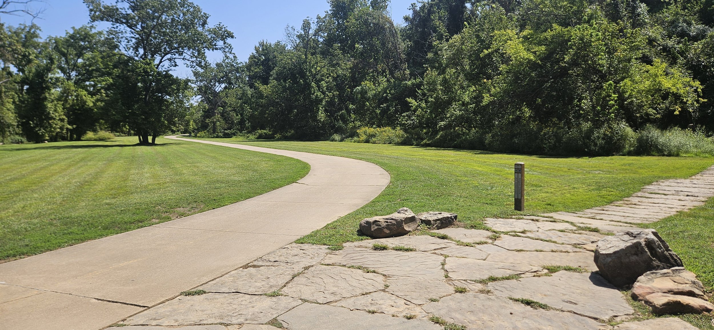 Image of Razorback Greenway and All American trail as they diverge in Slaughter Pen