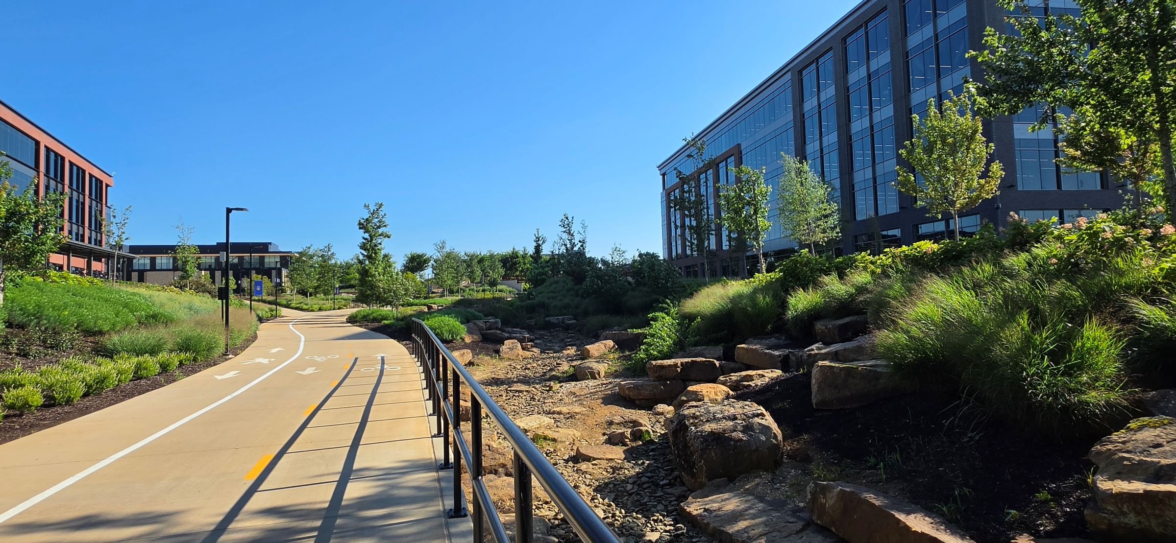 A picture of the Razorback greenway as it flows through the Walmart Home Office Campus